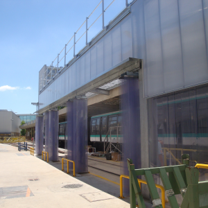 Mécanisme repliable accordéon pour porte à lanière coulissante